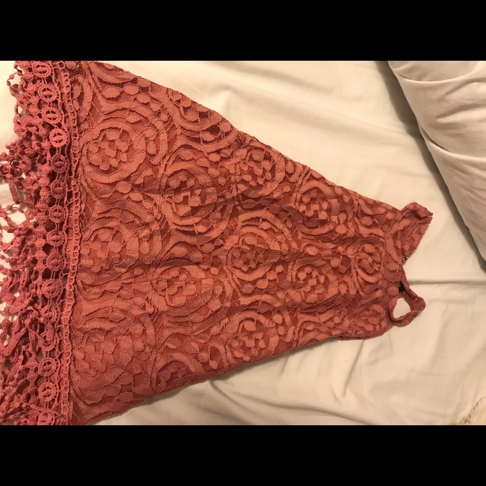 A high neck tank top good for fancy or casual wear